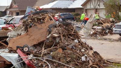 Debris Piled Up During Tornado Destruction Cleanup
