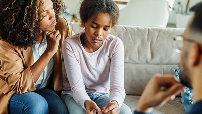 Family talking with daughter